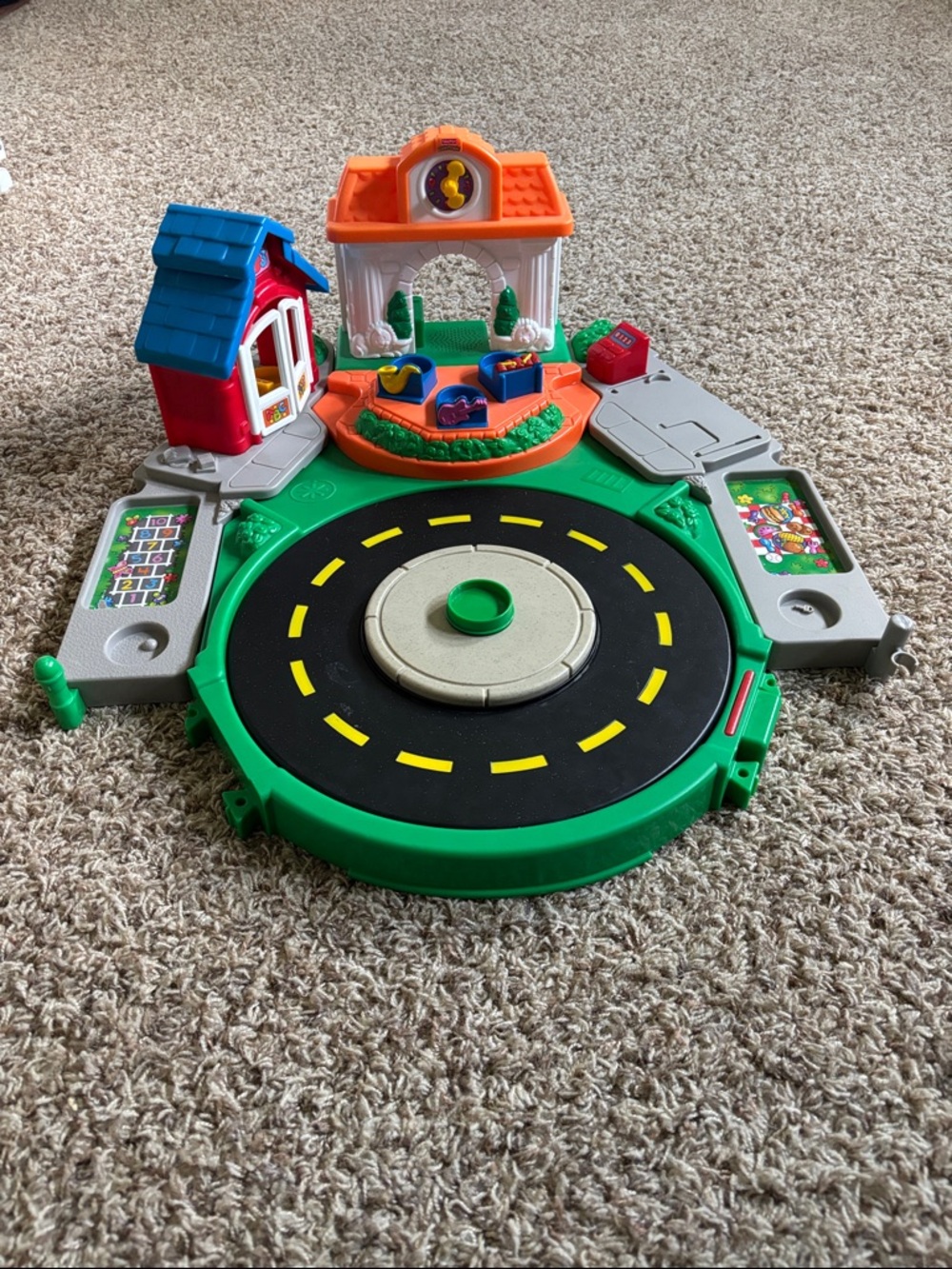 Fisher-Price Little People Discovery Village playset.